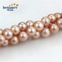 10mm Round AA Freshwater Peach Pearl Strand